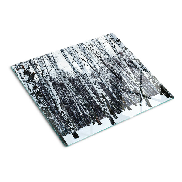 Glass kitchen board Winter forest with birches