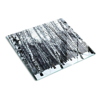 Glass kitchen board Winter forest with birches