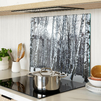 Glass kitchen board Winter forest with birches