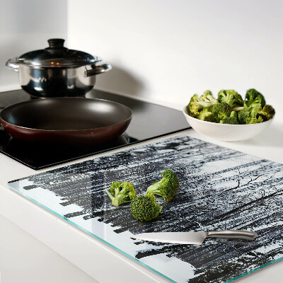 Glass kitchen board Winter forest with birches