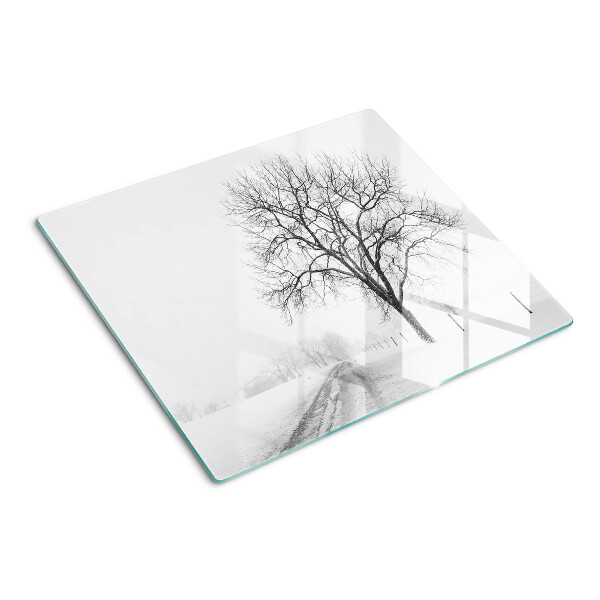 Glass kitchen board Empty winter landscape with a tree