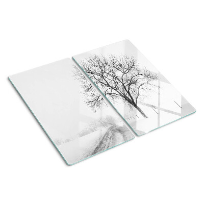 Glass kitchen board Empty winter landscape with a tree