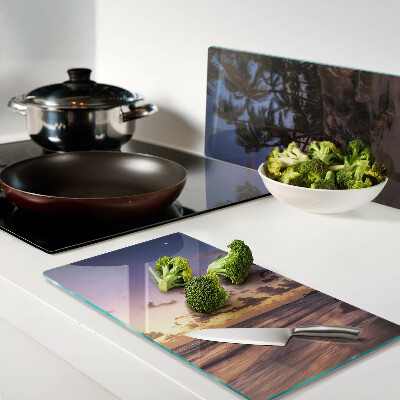 Glass chopping board Sunset over the beach