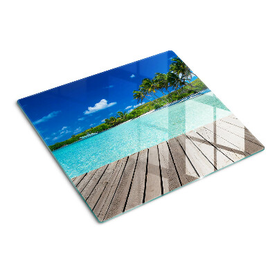Glass kitchen board Tropical beach with palm trees