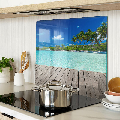 Glass kitchen board Tropical beach with palm trees