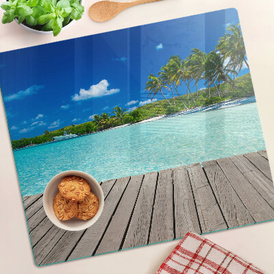 Glass kitchen board Tropical beach with palm trees