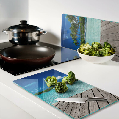 Glass kitchen board Tropical beach with palm trees
