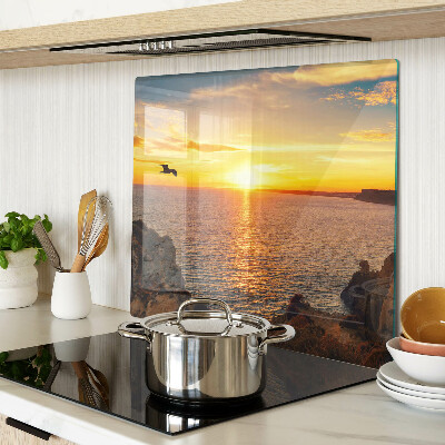 Glass kitchen board Sunset over the sea