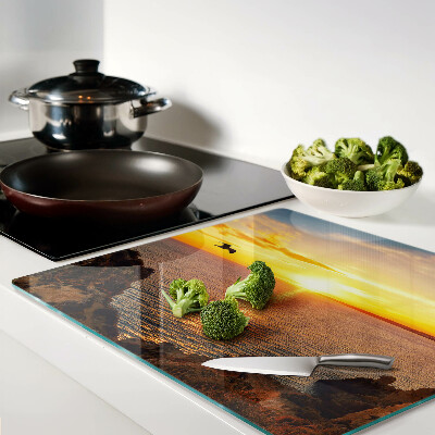 Glass kitchen board Sunset over the sea