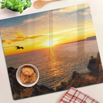 Glass kitchen board Sunset over the sea