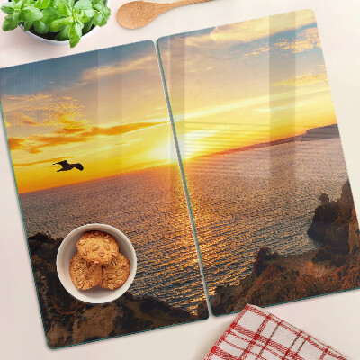 Glass kitchen board Sunset over the sea