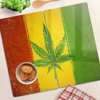 Glass kitchen board Hemp leaf on a colored background