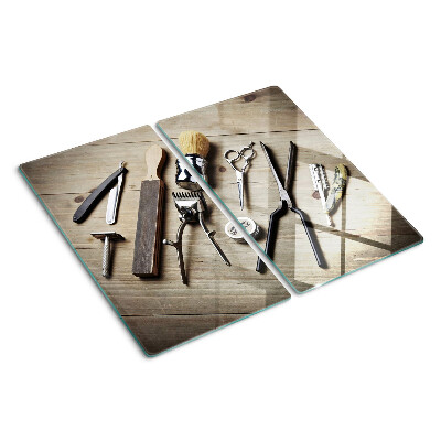 Glass kitchen board Hairdressing tools on a wooden background