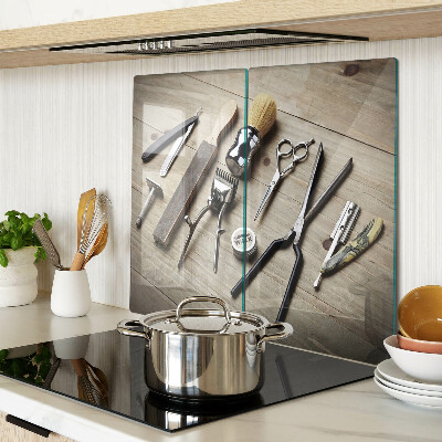 Glass kitchen board Hairdressing tools on a wooden background