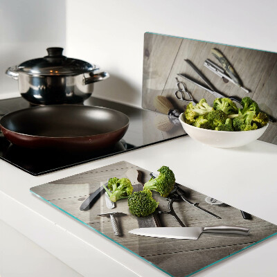 Glass kitchen board Hairdressing tools on a wooden background