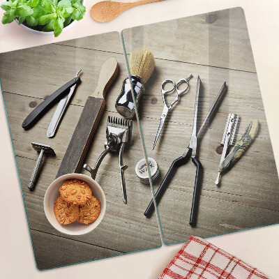Glass kitchen board Hairdressing tools on a wooden background