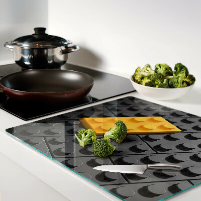 Glass chopping board LEGO bricks on a black background
