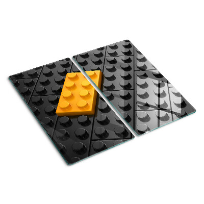 Glass chopping board LEGO bricks on a black background