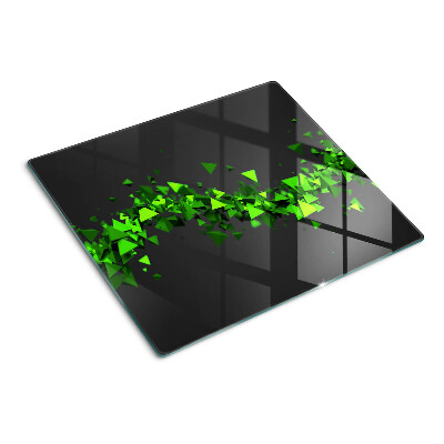 Glass kitchen board Green triangles on a black background