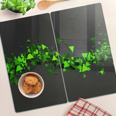 Glass kitchen board Green triangles on a black background