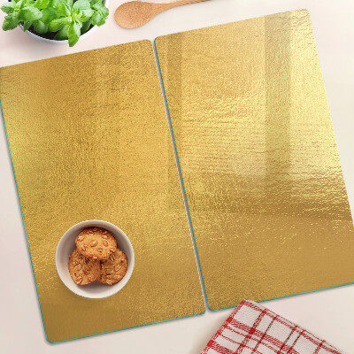 Glass chopping board Golden surface with reflections