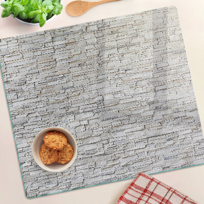 Glass chopping board Stone brick wall