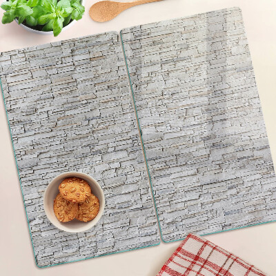 Glass chopping board Stone brick wall