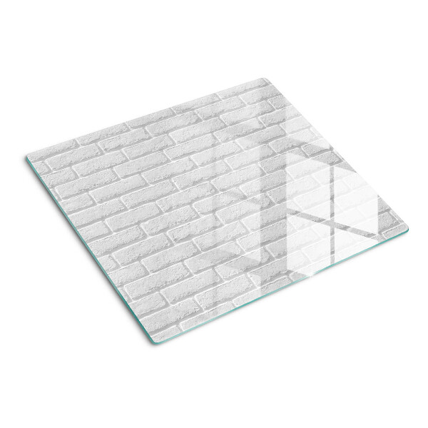 Glass chopping board Brick wall