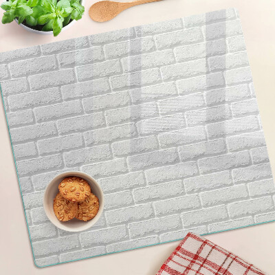 Glass chopping board Brick wall