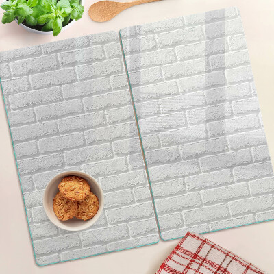 Glass chopping board Brick wall