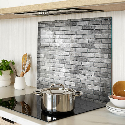 Glass kitchen board Brick wall in shades of gray