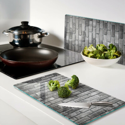 Glass kitchen board Brick wall in shades of gray