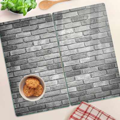 Glass kitchen board Brick wall in shades of gray