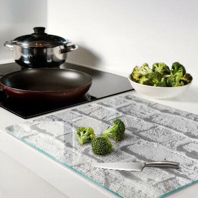 Glass chopping board Brick wall