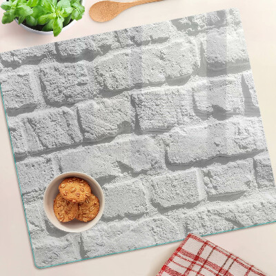 Glass chopping board Brick wall