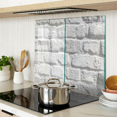 Glass chopping board Brick wall