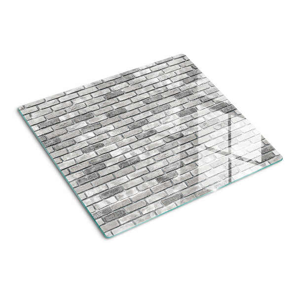 Glass chopping board Brick wall