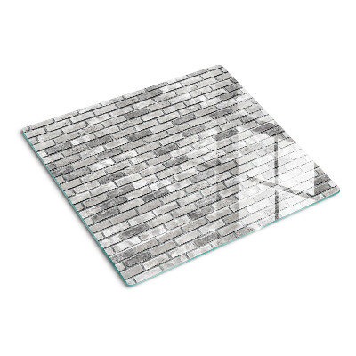 Glass chopping board Brick wall