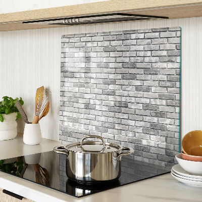 Glass chopping board Brick wall
