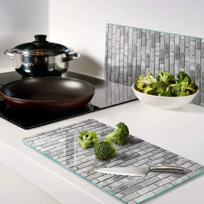 Glass chopping board Brick wall