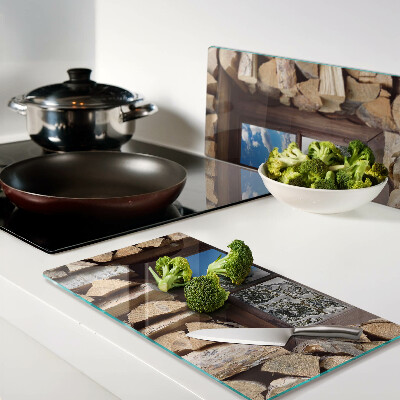 Glass chopping board View of a winter landscape through the window