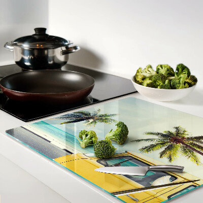 Glass kitchen board Beach with palm trees and a car