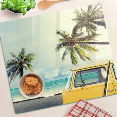 Glass kitchen board Beach with palm trees and a car