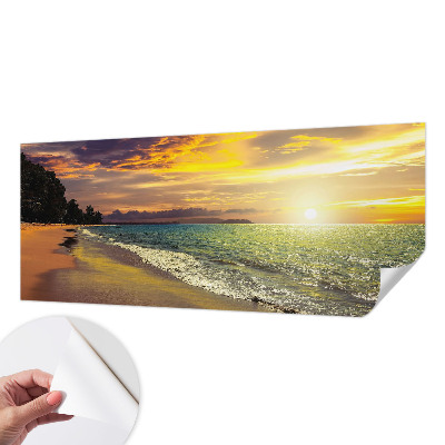 Self-adhesive wall mural with a beach at sunset motif