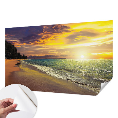 Self-adhesive wall mural with a beach at sunset motif