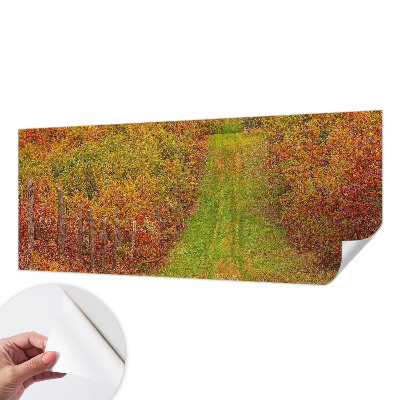 Removable wall mural with an autumn color palette