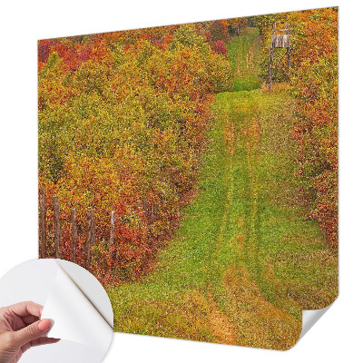 Removable wall mural with an autumn color palette