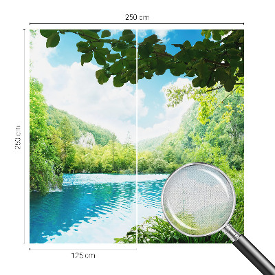 Baby room wall mural with a natural oasis design