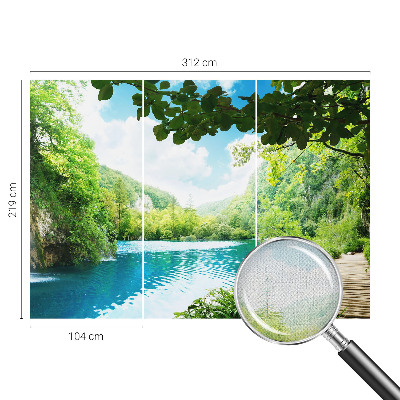 Baby room wall mural with a natural oasis design