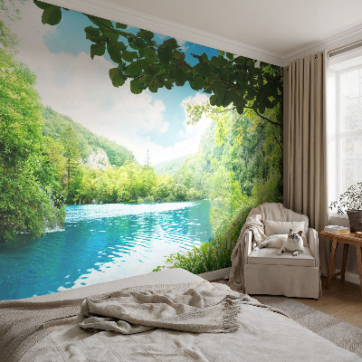 Baby room wall mural with a natural oasis design